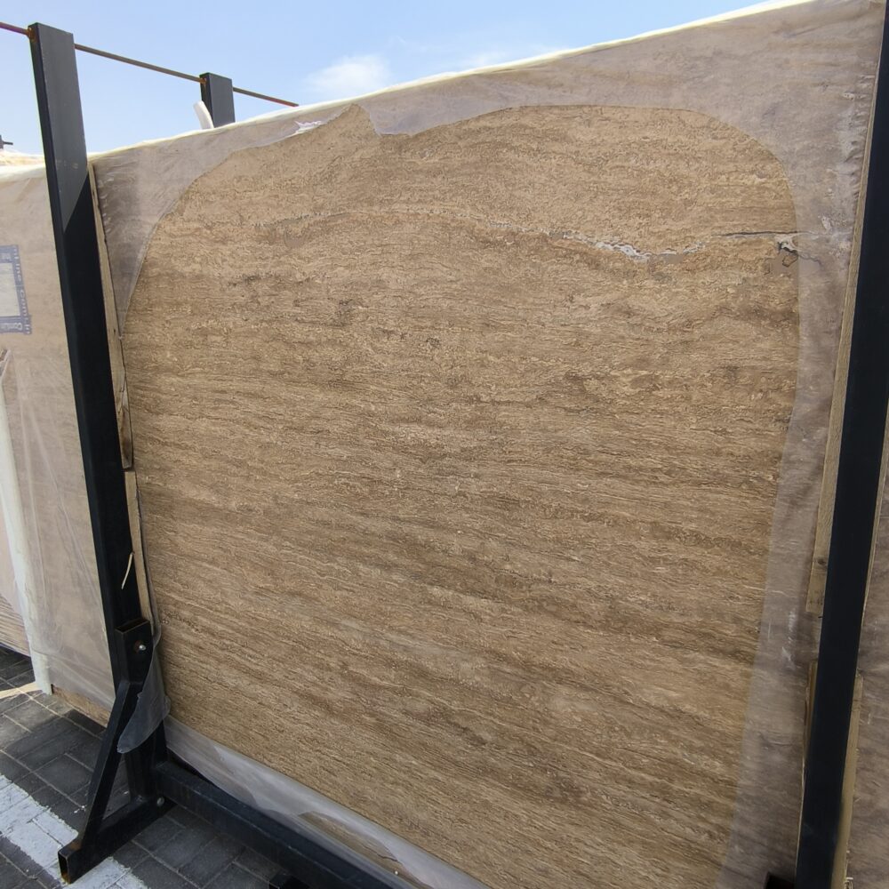 Travertine Notcha Kachan Dark - Lazulite Marble High-quality Travertine Notcha Kachan Dark slab showing intense chocolate brown and deep walnut tones with a natural porous texture.