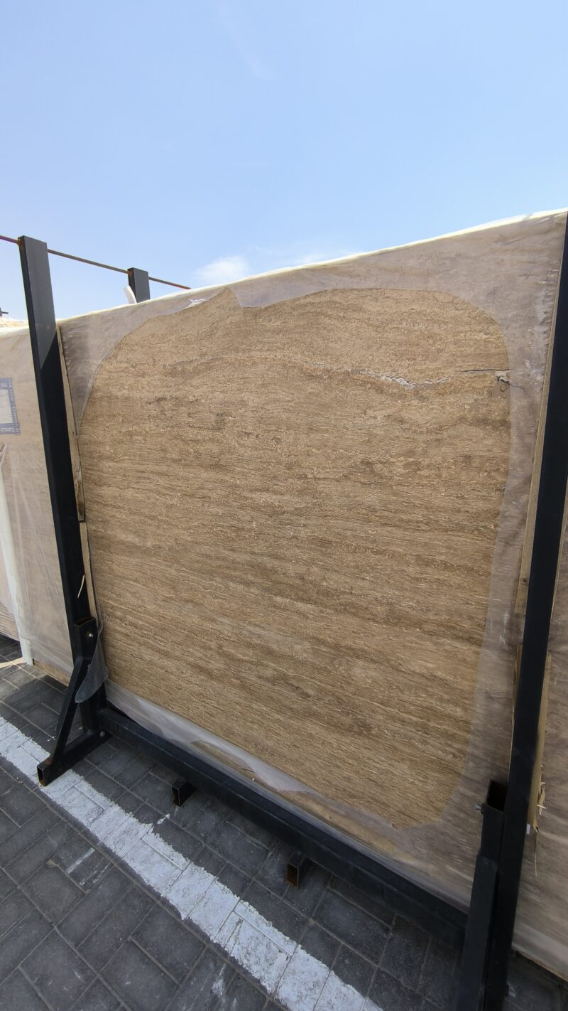 Travertine Notcha Kachan Dark - Lazulite Marble High-quality Travertine Notcha Kachan Dark slab showing intense chocolate brown and deep walnut tones with a natural porous texture.
