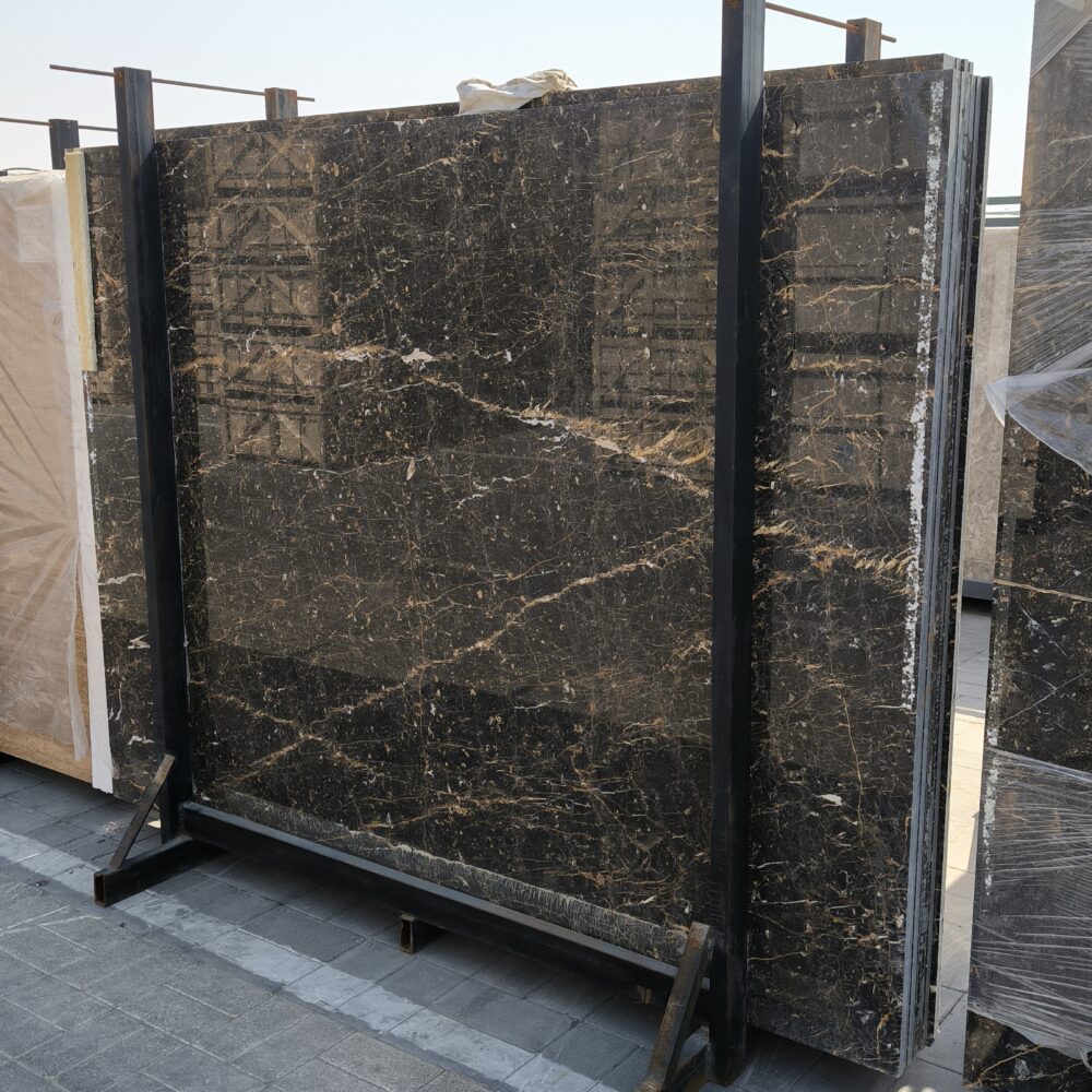 Golden Black Marble - Lazulite Marble High-quality Golden Black Marble slab displaying a deep black background with striking white lines and random golden flakes.